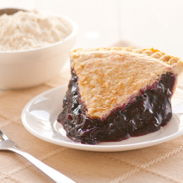 Our Classic Blueberry Pie is filled with plump, ripe blueberries in a thick flavorful filling then baked in our homemade pie crusts. No artificial flavorings and colorings are used. Our double-crusted fruit pies are lightly brushed with butter and sprinkled with sugar to brown the crust.
Pies will arrive pre-baked and frozen in an insulated shipping cooler. Simply thaw in the oven and your home will be filled with the sweet scent of our Amish bakery. Instructions are included. 9 inch pie. Homemade Amish Pi