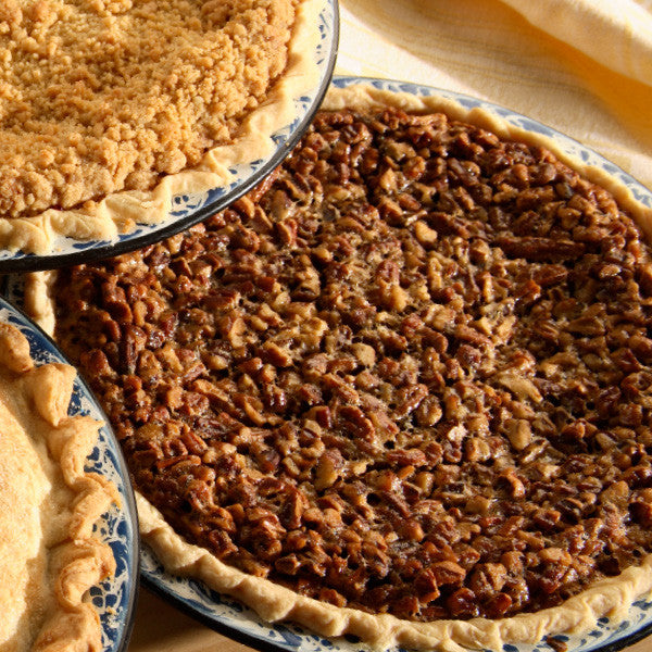 Full of butter and fresh eggs, this sweet and rich pie is topped off with crunchy pecans and baked into our homemade pie crusts. Eat it warm and topped off with a dollop of ice cream or whipped cream! Pies will arrive pre-baked and frozen in an insulated shipping cooler. Simply thaw in the oven and your home will be filled with the sweet scent of our Amish bakery. Instructions are included.
Baked and shipped from Ohio's Amish Country.
Available as 9 inch pie.