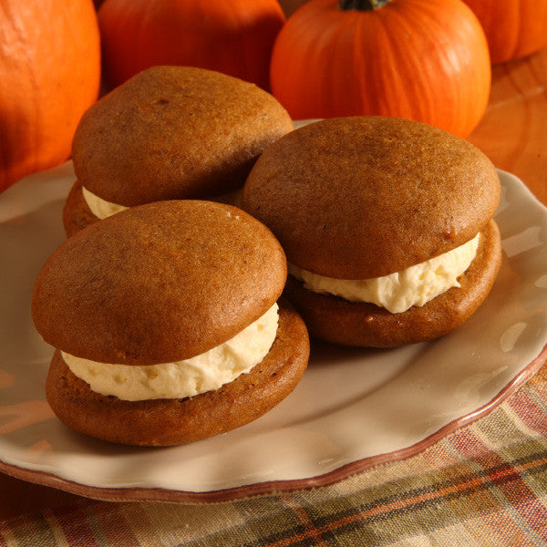 Few things say fall like a delicious pumpkin whoopie pie! These pumpkin cookie sandwiches are soft moist pumpkin cake "cookies" filled with sweet, light and fluffy filling.
Pumpkin whoopie pies are approximately three inches in diameter. Homemade in Ohio's Amish Country.