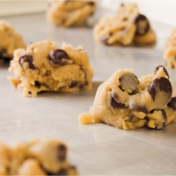 Even if you don't really have time to bake, we've made it easy to always have fresh cookies on hand. Made with the same recipes we use in our bakeries, our cookie dough comes nine varieties. Icing for frosted cookies (buttermilk, iced oatmeal and cut-out cookies) is included in your price. Drop onto a cookie sheet and bake - it's easy! 

Available in 3 lb. tubs. Makes approximately 3 dozen medium-sized cookies. 