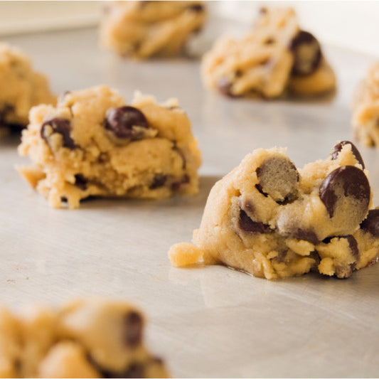 Even if you don't really have time to bake, we've made it easy to always have fresh cookies on hand. Made with the same recipes we use in our bakeries, our cookie dough comes nine varieties. Icing for frosted cookies (buttermilk, iced oatmeal and cut-out cookies) is included in your price. Drop onto a cookie sheet and bake - it's easy! 

Available in 3 lb. tubs. Makes approximately 3 dozen medium-sized cookies. 