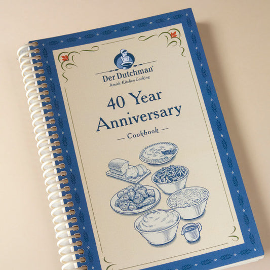 After 40 years in business, Der Dutchman Walnut Creek has been blessed to serve excellent food in the tradition of the Amish culture. This cookbook is a celebration the history of the restaurant and is filled with both restaurant recipes as well as recipes collected from our current staff members. A few restaurant recipes include our popular dishes such as date pudding, marinated carrots, chicken noodle soup, and Amish stuffing. Staff recipes include hot pepper butter, dandelion gravy and soft pretzels.

15