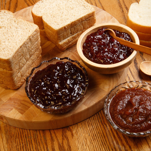 The perfect accompaniment for Sunday dinner rolls, these simply sweet jams are made from the freshest fruits, pure cane sugar, and all-natural ingredients - no preservatives added.

Choose from country favorites including strawberry, strawberry rhubarb, seedless red raspberry and black raspberry - plus no-sugar-added varieties. Available in 16oz jars.